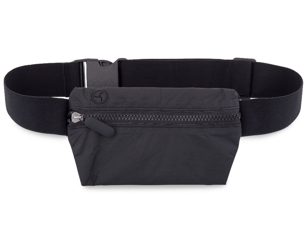 A black lay flat fanny pack belt bag with an adjustable elastic belt a front zipper pocket and inside zipper pocket on white background