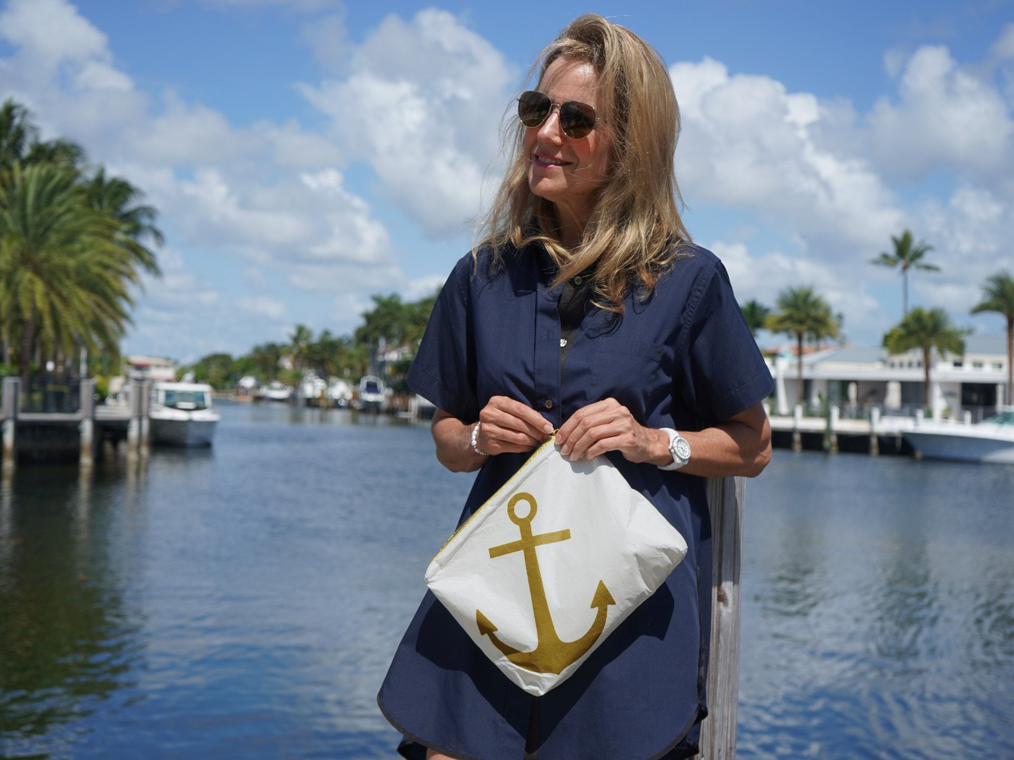 white medium zipper pouch with gold anchor