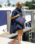 zipper handbag with red stripes in navy blue water resistant fabric