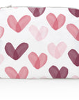 Medium zipper pouch in "Language of Love" pink heart print on white background