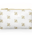 Mini zipper pouch in shimmer white with gold bee pattern on white background
