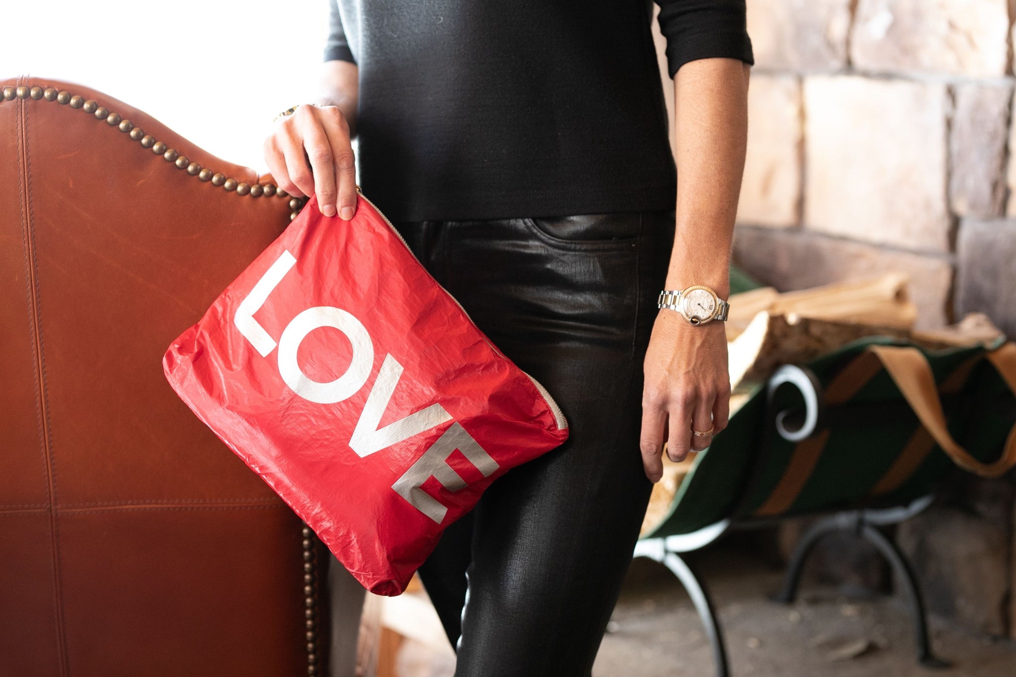 Stylish red clutch with silver "LOVE"