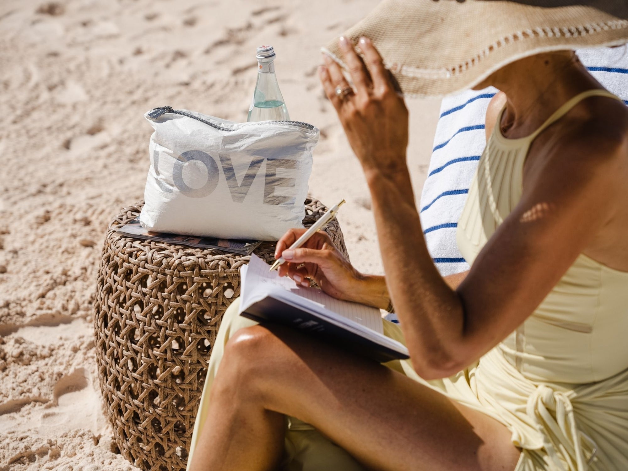 Water-resistant medium zipper pack in shimmer with with silver "LOVE" for all seasons