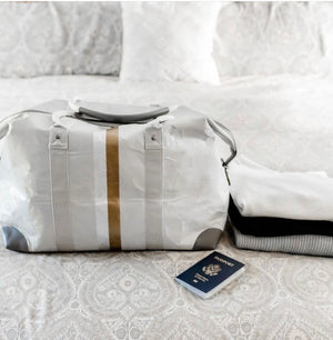 weekender duffle carryon in gray with gold & silver stripes