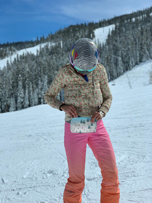 ski pattern wristlet pouch on the slopes