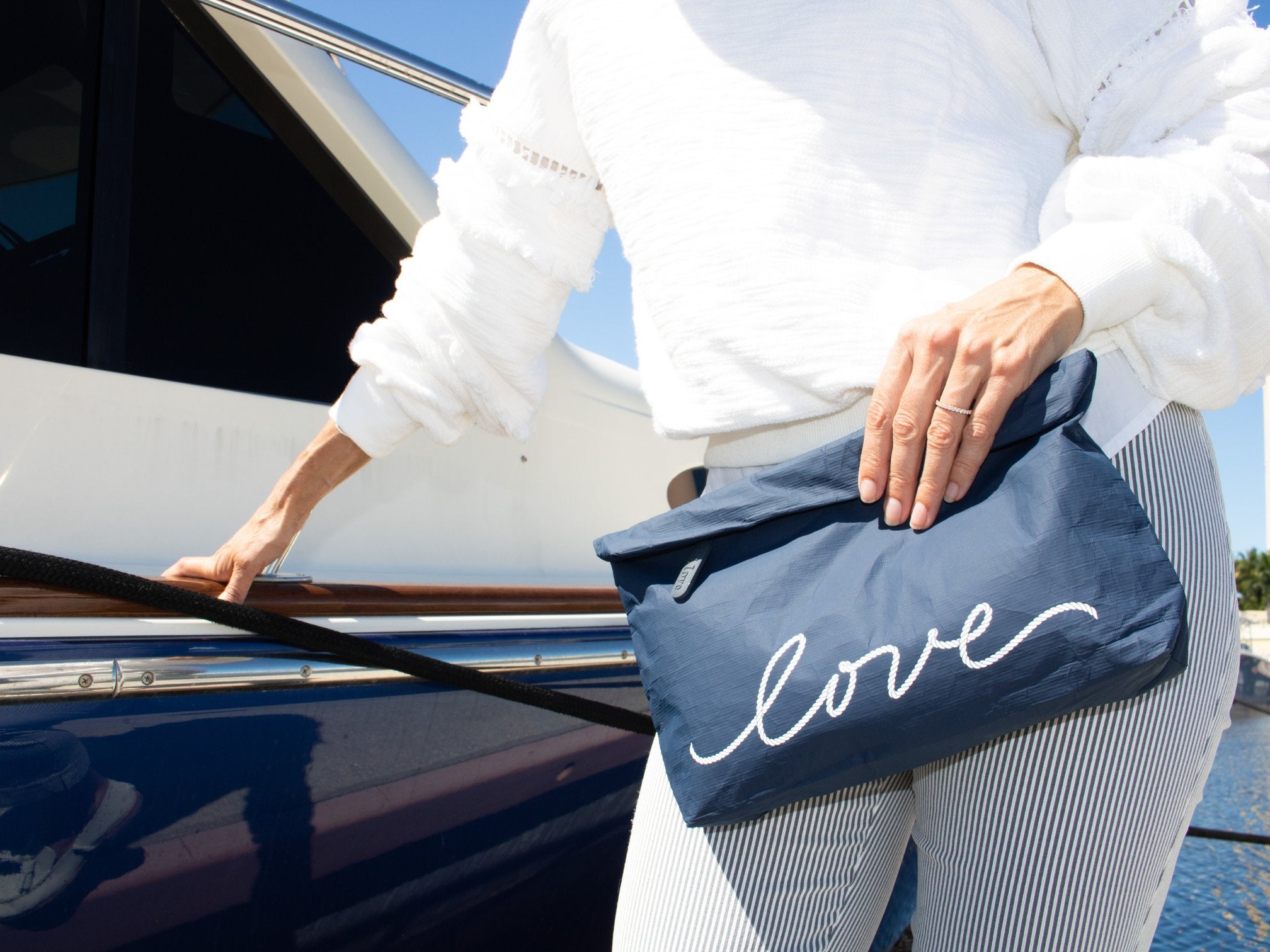 medium clutch purse in navy with nautical love