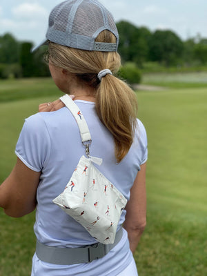 add wrist strap to pouch for easy golfing