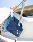zipper wristlet in navy blue with nautical heart